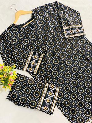 2 Pcs Women's Stitched Lawn Plain Shirt And Trouser